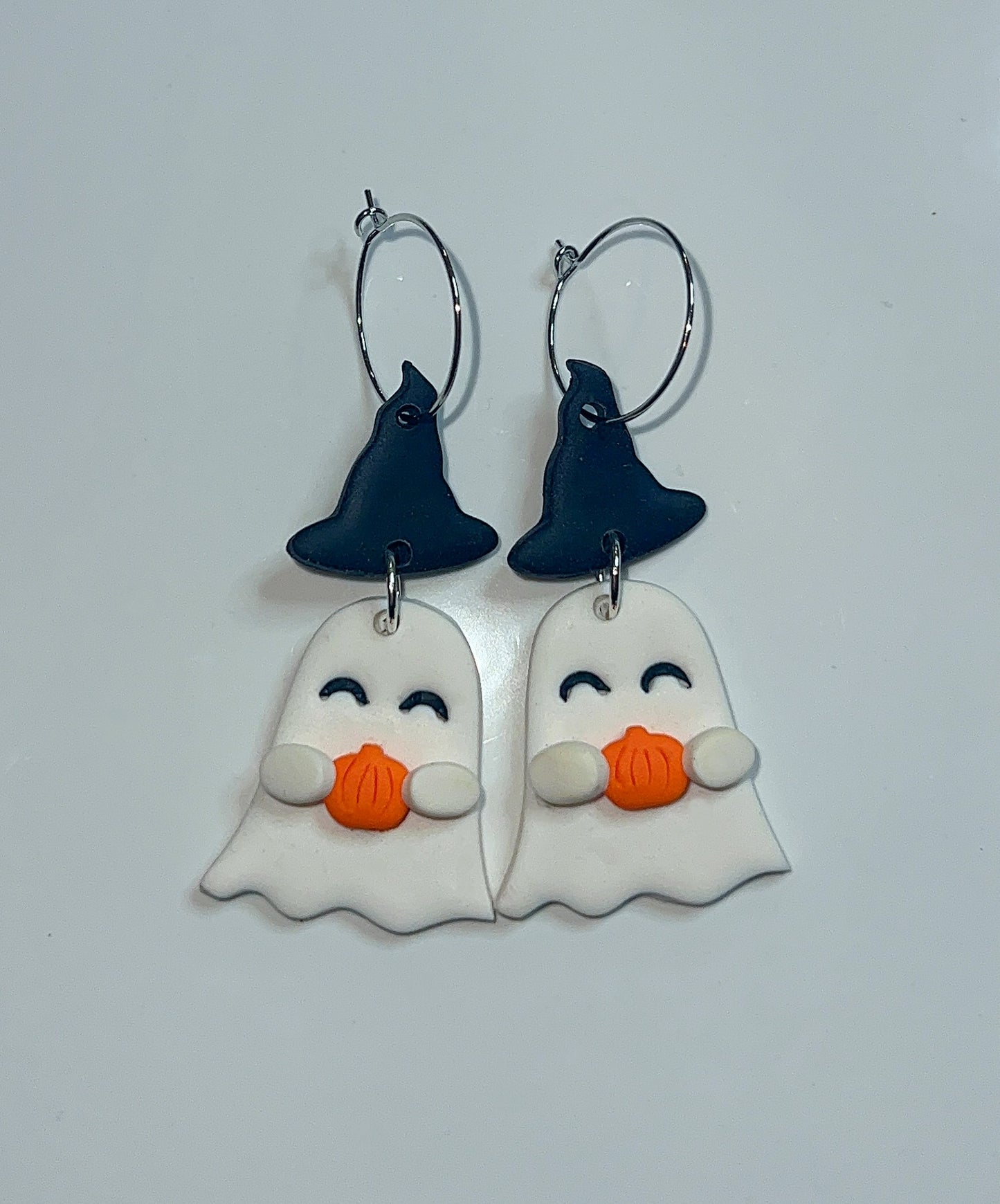 Ghost holding pumpkin drop earrings